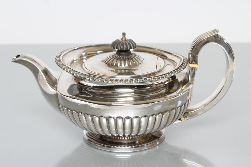 A GEORGE IV SILVER TEAPOT Image