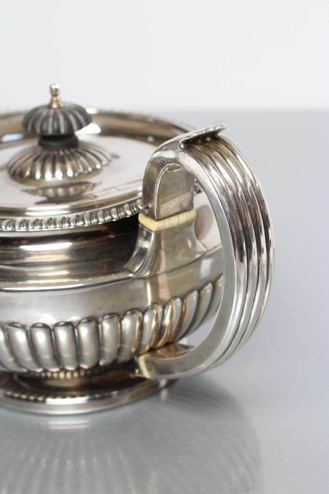 A GEORGE IV SILVER TEAPOT Image