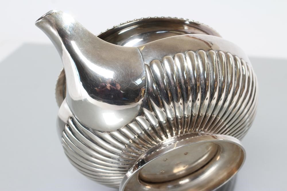 A GEORGE IV SILVER TEAPOT Image