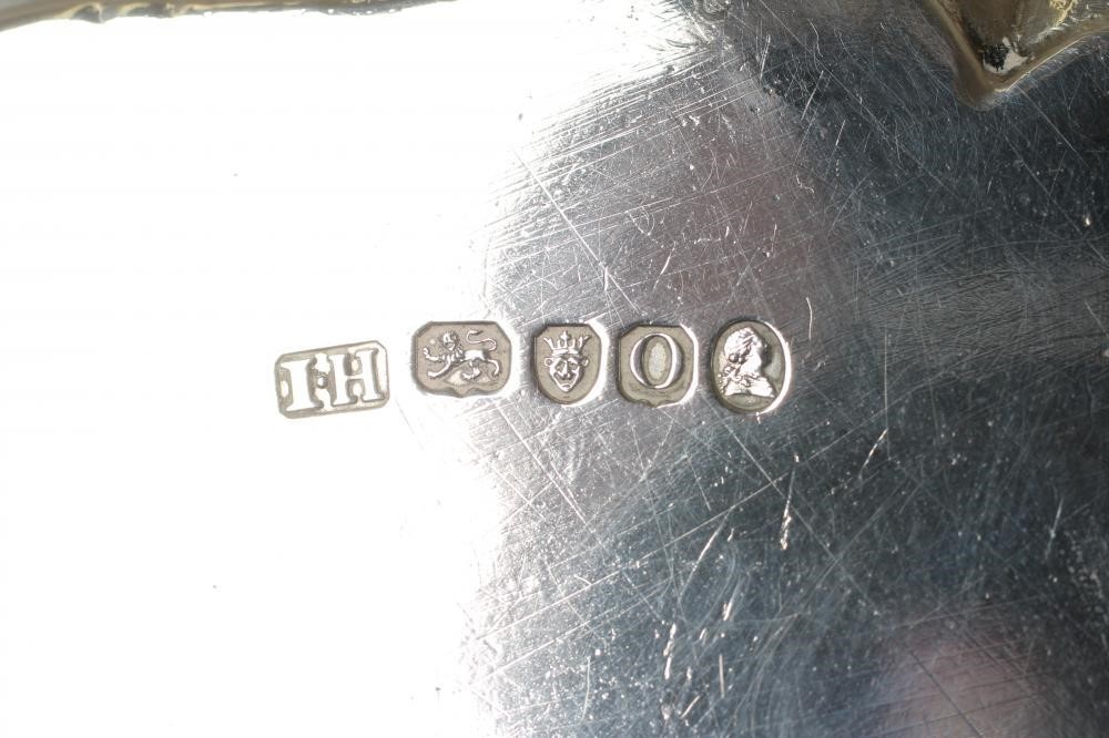 A GEORGE III SMALL SILVER SALVER Image