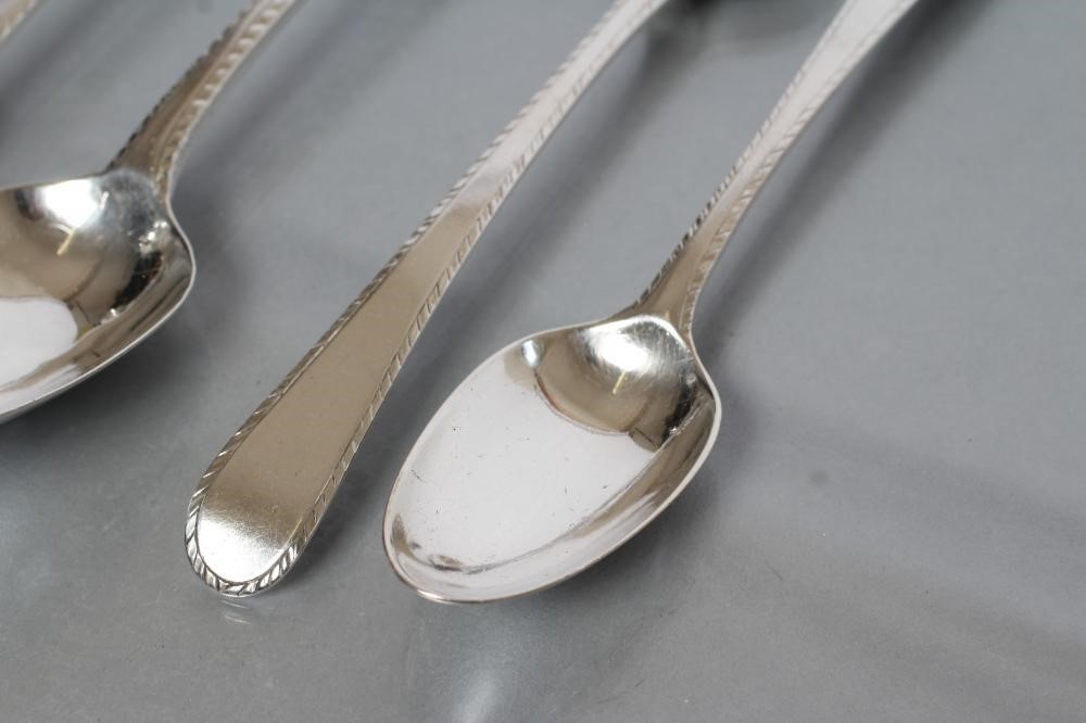 A PAIR OF GEORGE III SILVER TABLESPOONS AND A MATCHING PAIR OF DESSERT SPOONS Image