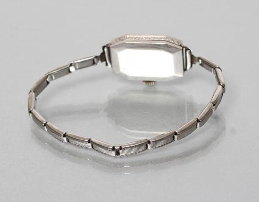 AN ART DECO DIAMOND COCKTAIL WATCH Image