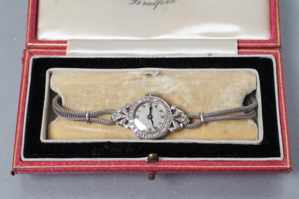 AN ART DECO DIAMOND COCKTAIL WATCH Image
