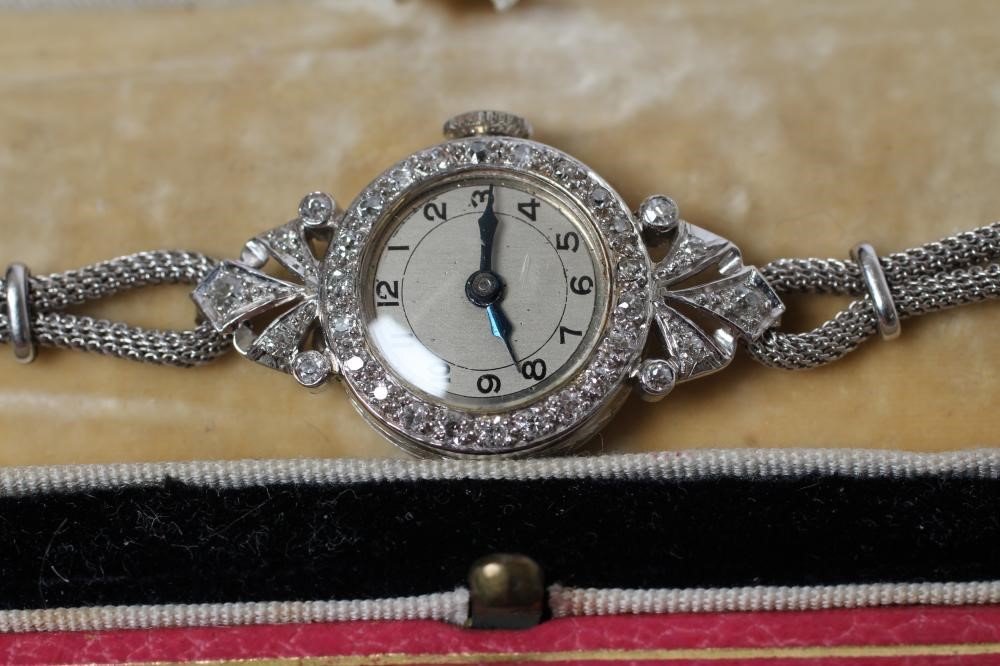 AN ART DECO DIAMOND COCKTAIL WATCH Image