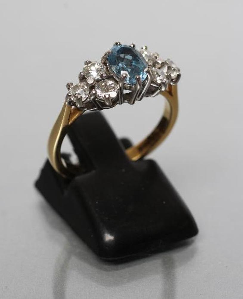 AN AQUAMARINE AND DIAMOND DRESS RING Image