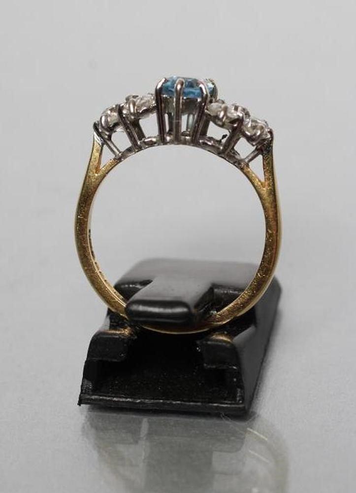 AN AQUAMARINE AND DIAMOND DRESS RING Image