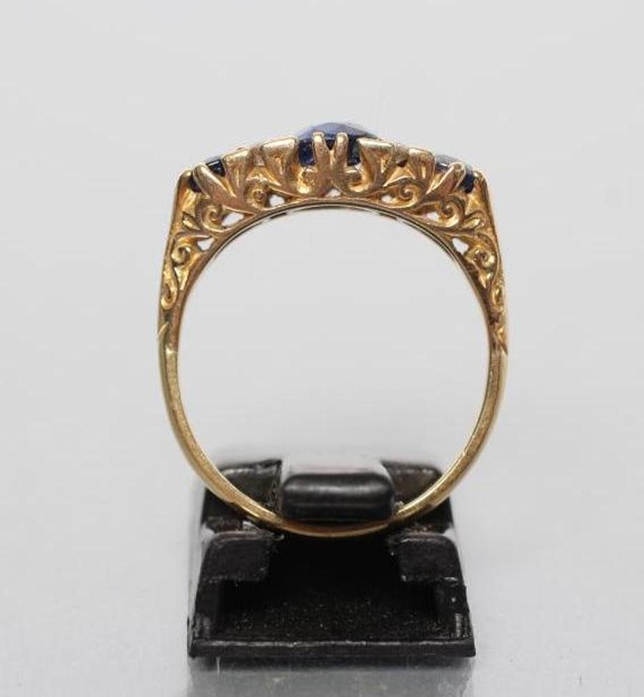 A SAPPHIRE HALF HOOP RING Image