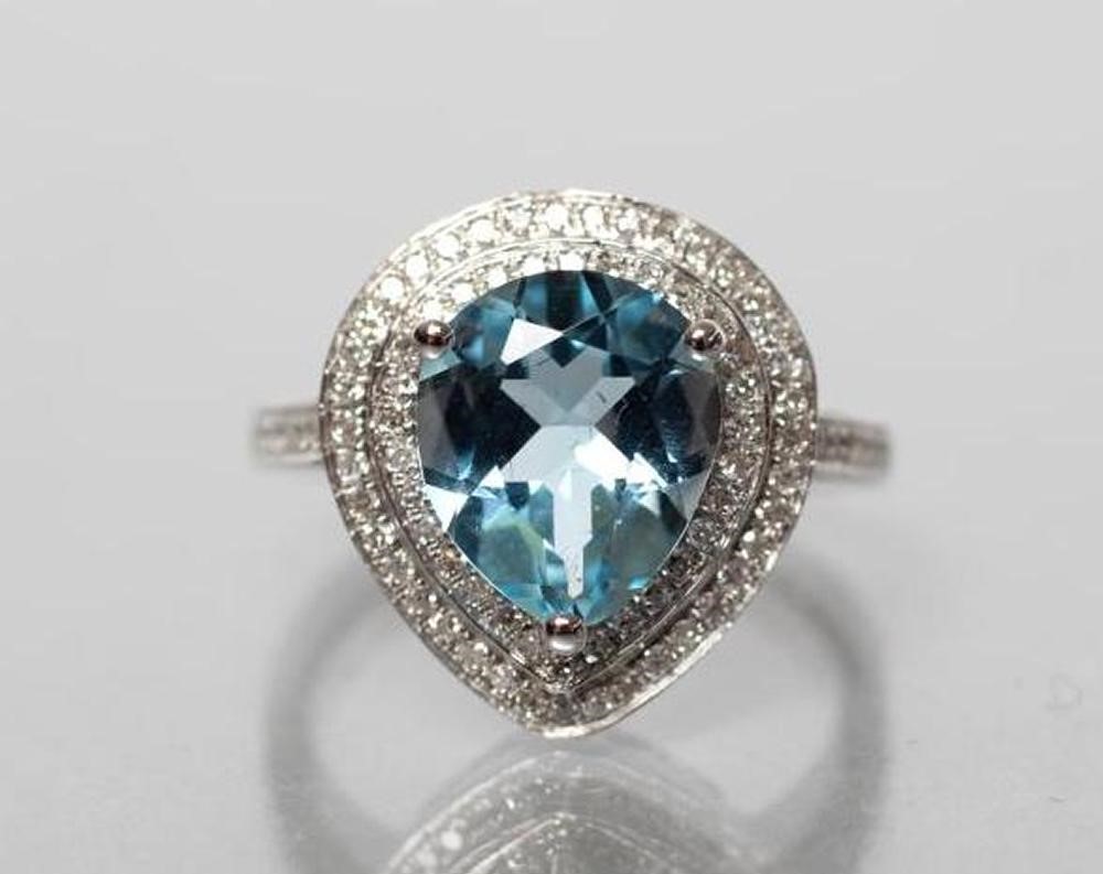 A TOPAZ AND DIAMOND COCKTAIL RING Image