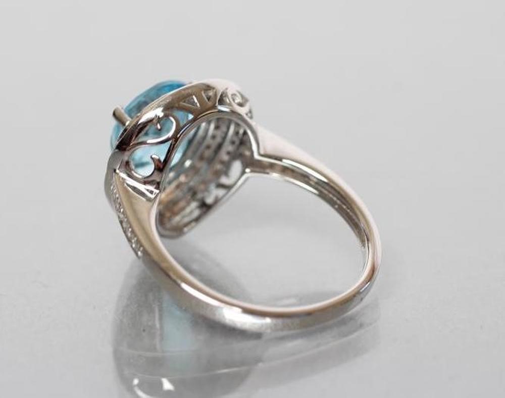 A TOPAZ AND DIAMOND COCKTAIL RING Image