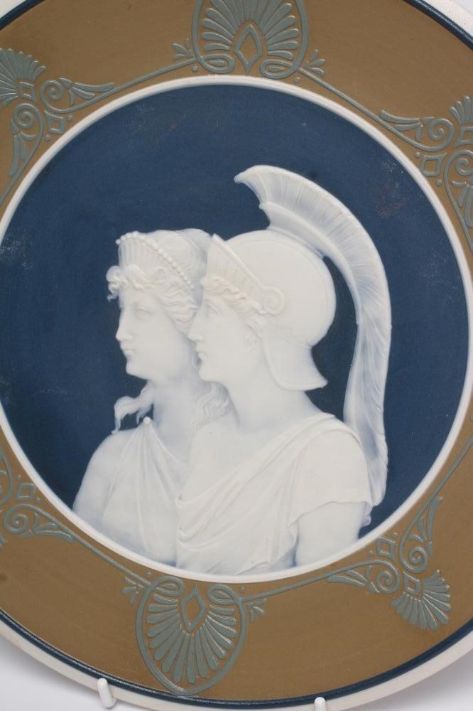 A PAIR OF METTLACH SALTGLAZE STONEWARE PLAQUES Image