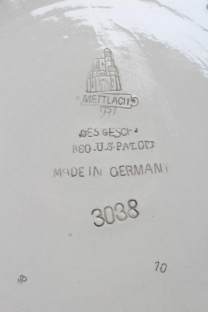 A PAIR OF METTLACH SALTGLAZE STONEWARE PLAQUES Image