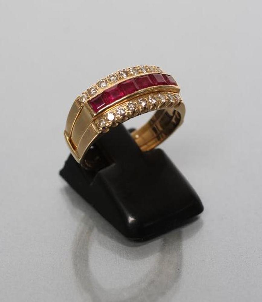 A RUBY AND DIAMOND HALF HOOP RING Image