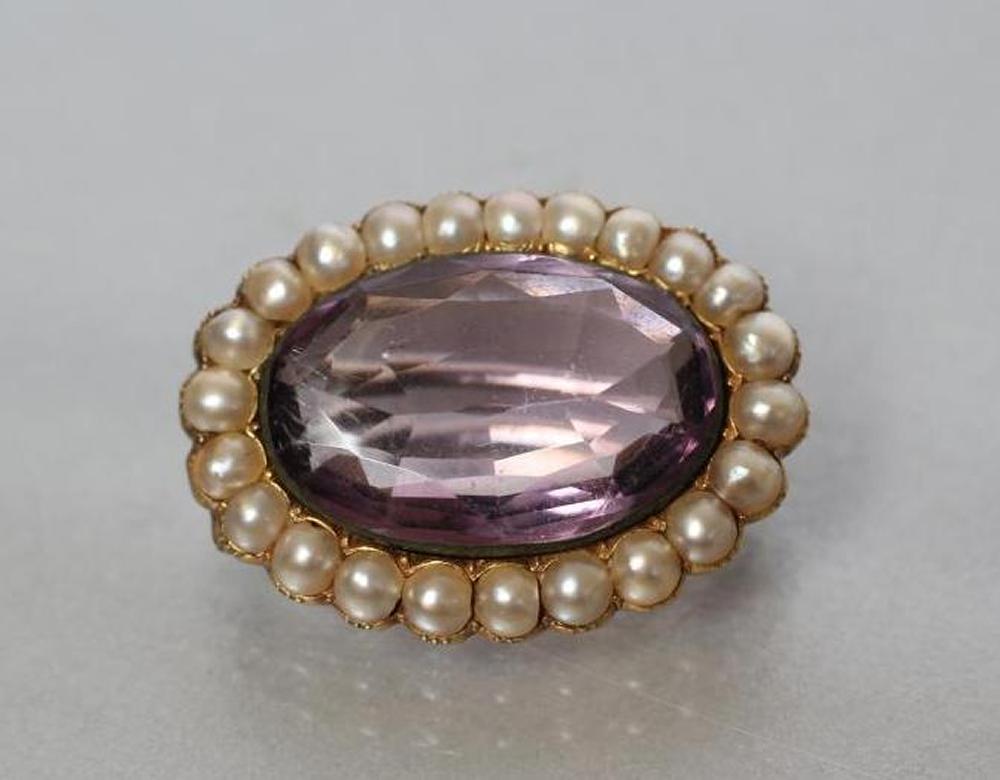 A VICTORIAN AMETHYST AND PEARL BROOCH Image