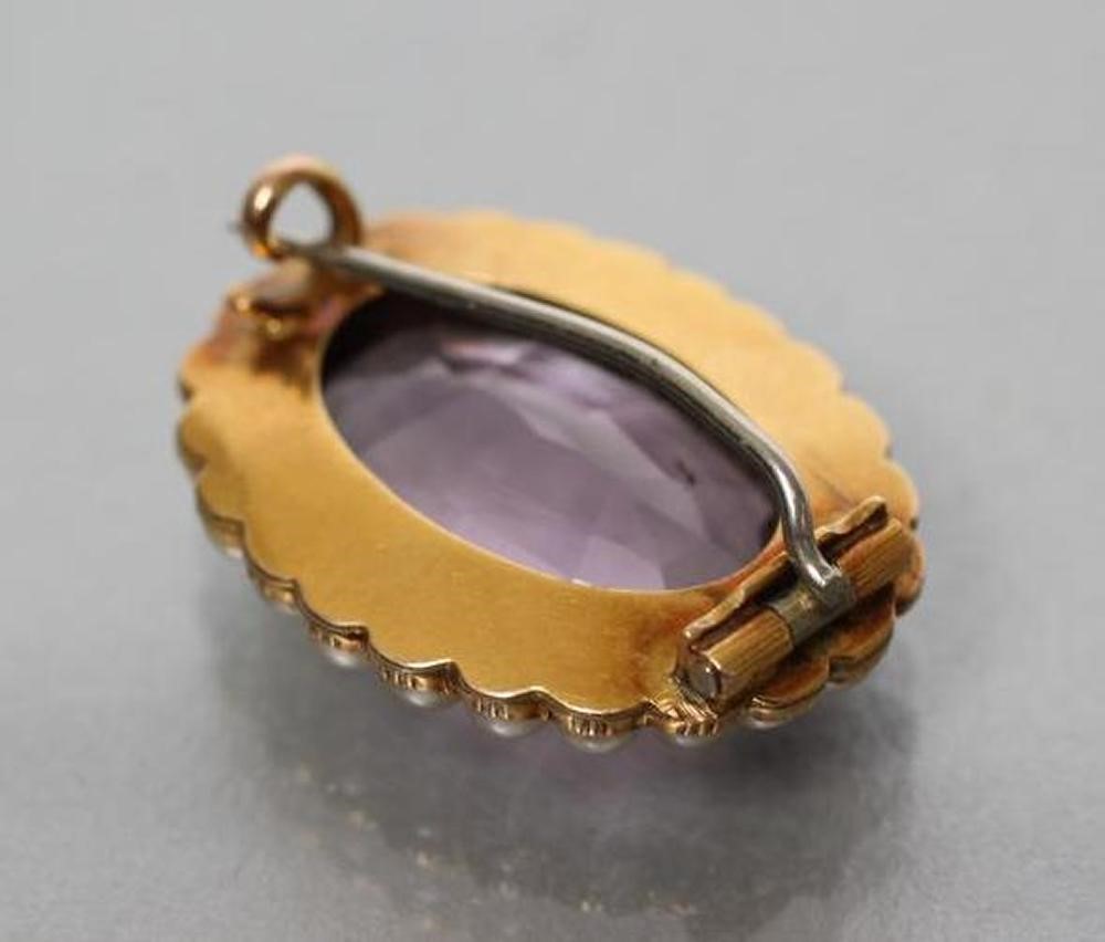 A VICTORIAN AMETHYST AND PEARL BROOCH Image