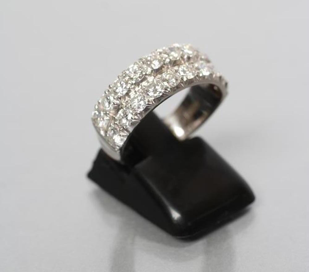 A DIAMOND HALF HOOP ETERNITY RING Image