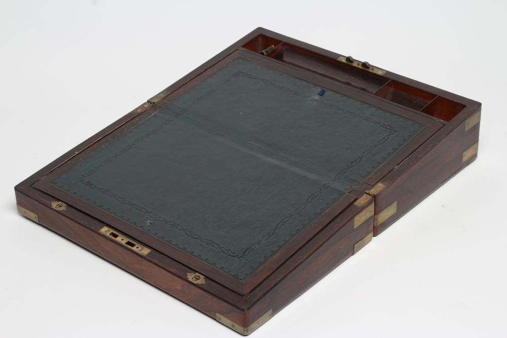 A ROSEWOOD AND BRASS MOUNTED CAMPAIGN WRITING BOX Image
