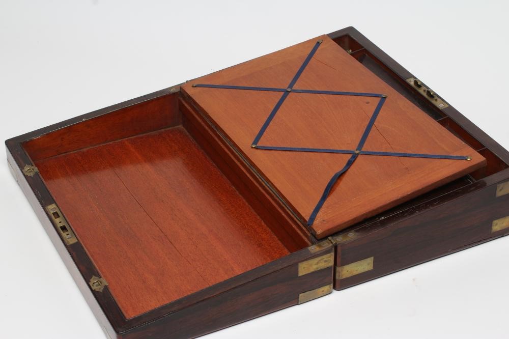 A ROSEWOOD AND BRASS MOUNTED CAMPAIGN WRITING BOX Image