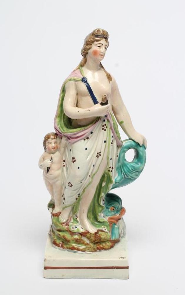 A POLYCHROME PEARLWARE FIGURE OF VENUS Image