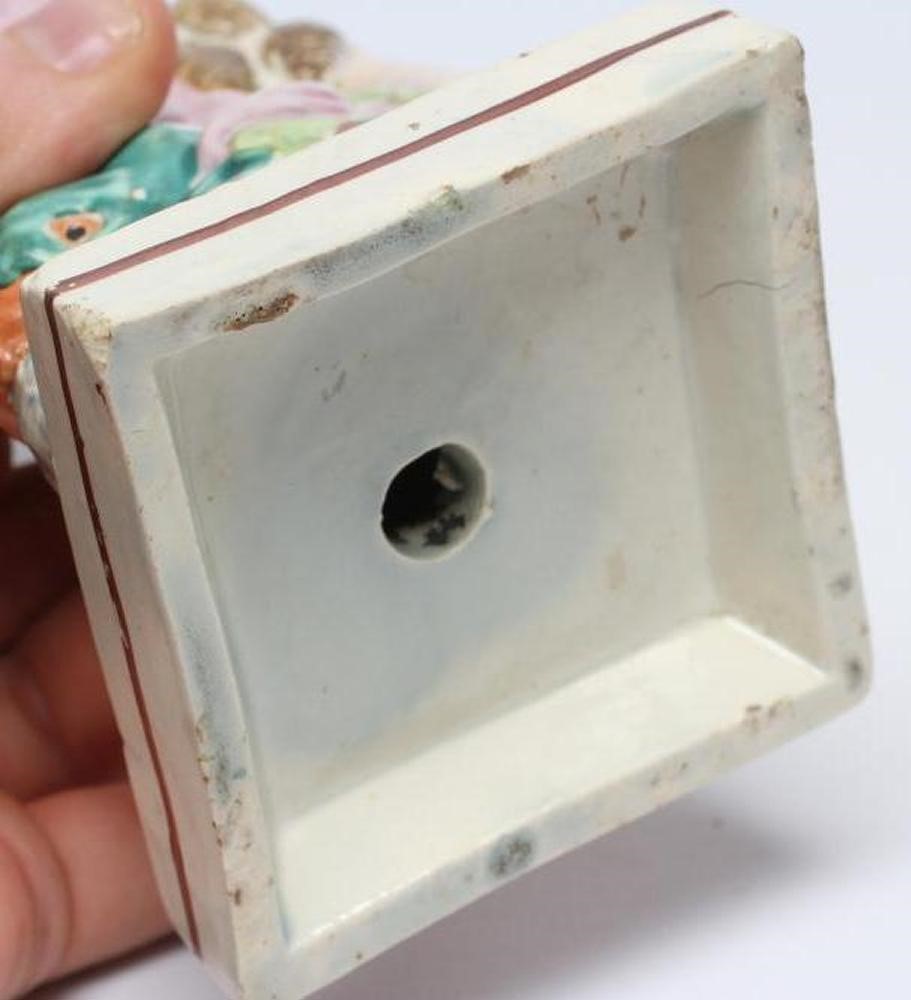 A POLYCHROME PEARLWARE FIGURE OF VENUS Image