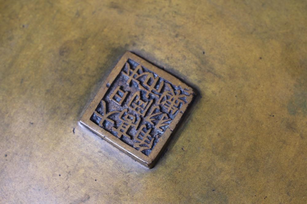 A JAPANESE BRONZE VASE of baluster form with cast and applied dragon handles and panels of Image