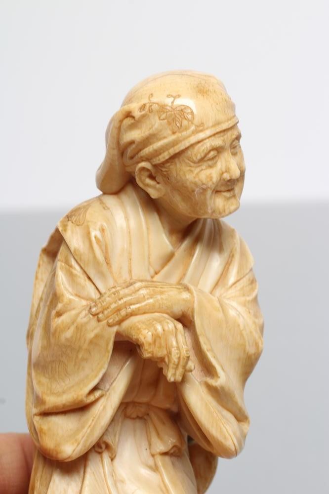 A JAPANESE ONE PIECE IVORY OKIMONO Image