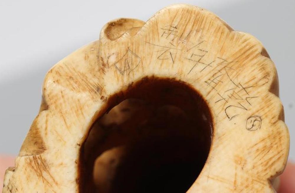 A JAPANESE ONE PIECE IVORY OKIMONO Image