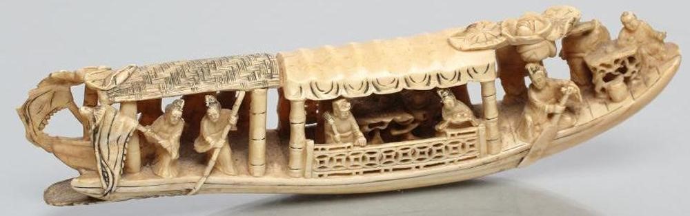 A JAPANESE ONE PIECE IVORY FIGURE GROUP Image