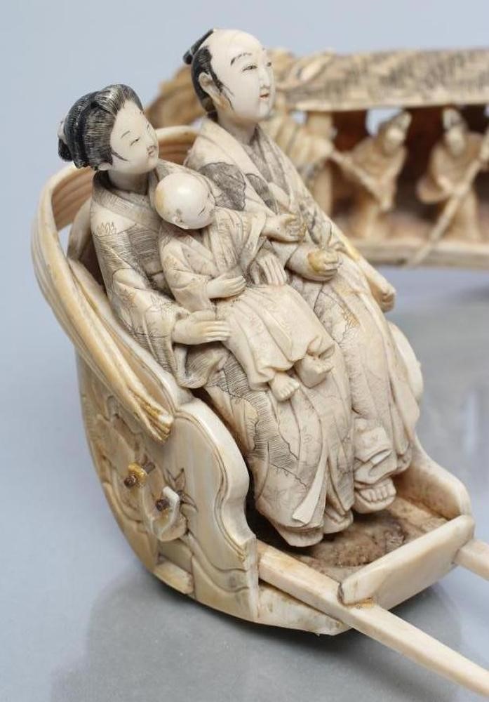 A JAPANESE ONE PIECE IVORY FIGURE GROUP Image