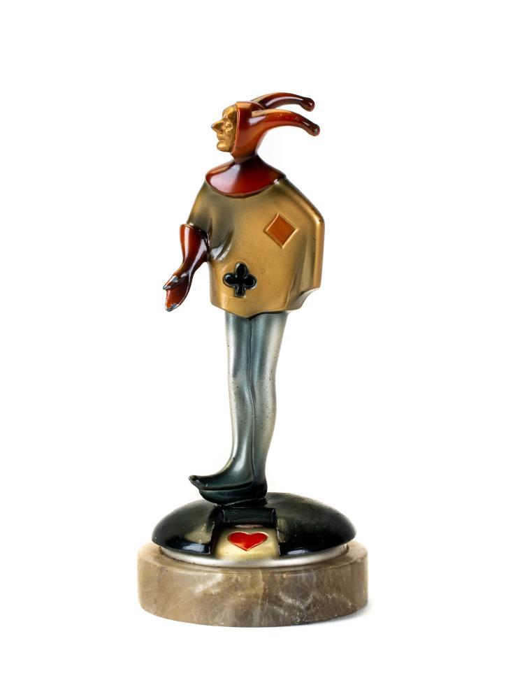 AFTER ROLAND PARIS - an Art Deco cold painted spelter figural bridge marker modelled as a jester in Image