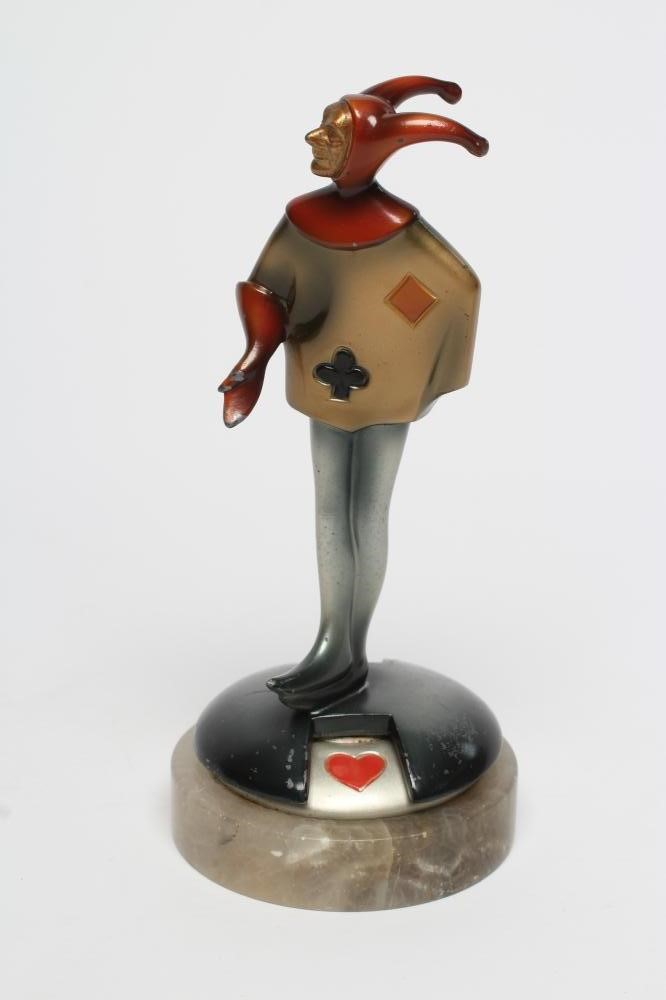 AFTER ROLAND PARIS - an Art Deco cold painted spelter figural bridge marker modelled as a jester in Image