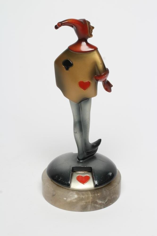 AFTER ROLAND PARIS - an Art Deco cold painted spelter figural bridge marker modelled as a jester in Image