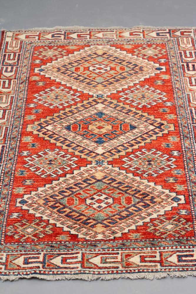 A PERSIAN TRIBAL RUG Image