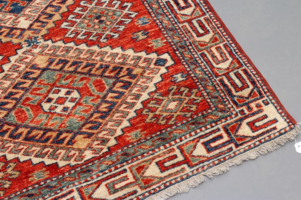 A PERSIAN TRIBAL RUG Image