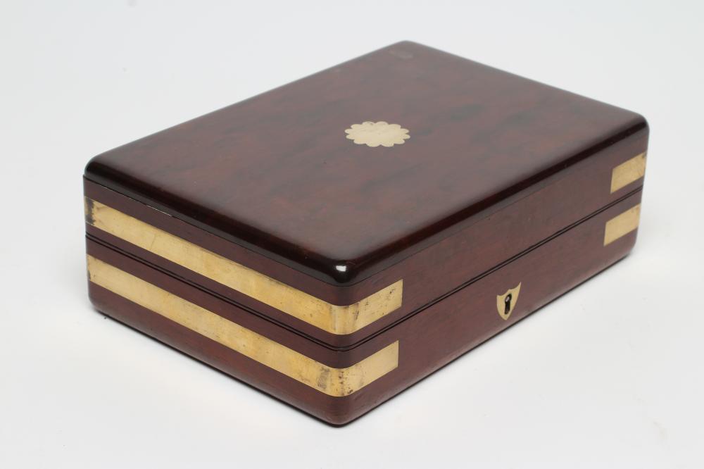 A MAHOGANY CAMPAIGN TRAVELLING CASE Image