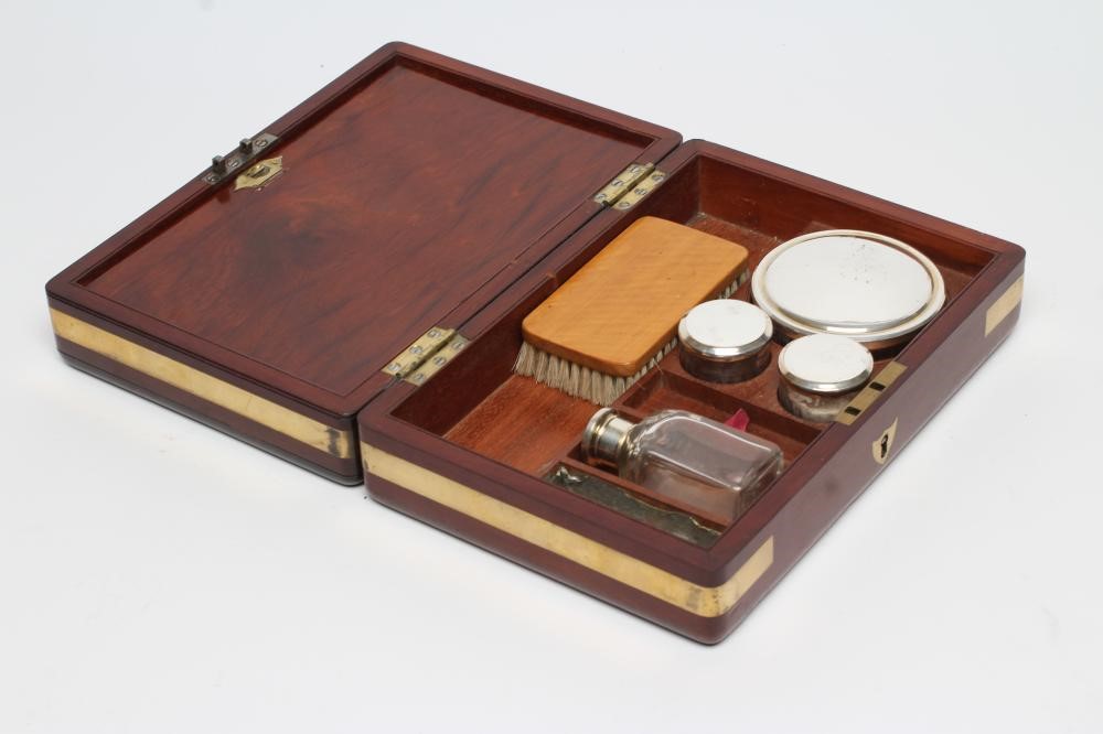 A MAHOGANY CAMPAIGN TRAVELLING CASE Image