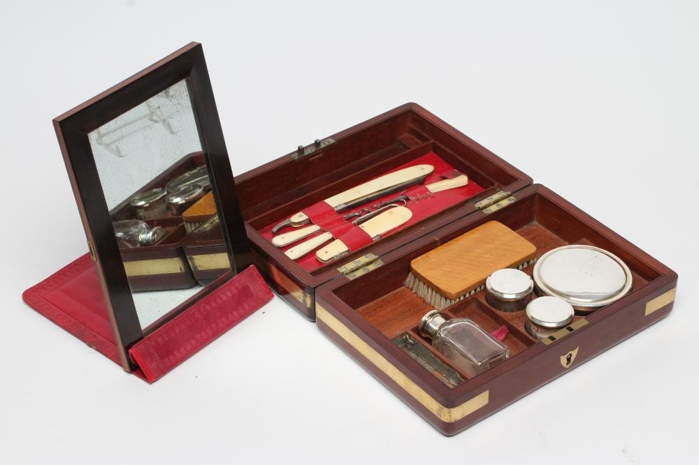 A MAHOGANY CAMPAIGN TRAVELLING CASE Image