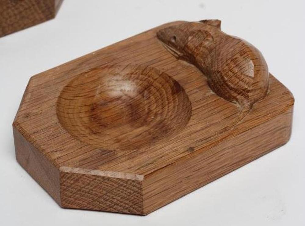 A ROBERT THOMPSON ADZED OAK SMALL CHOPPING BOARD/STAND of octagonal form Image