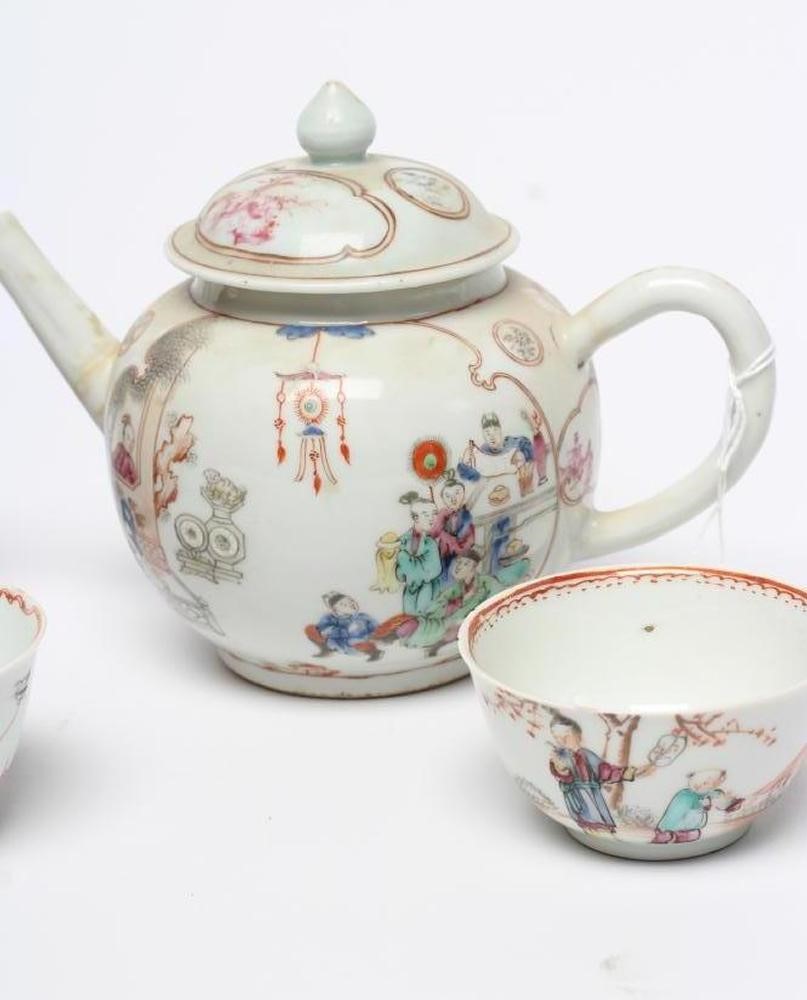 A COLLECTION OF CHINESE POLYCHROME PORCELAIN comprising a teapot and cover painted with figures on a Image