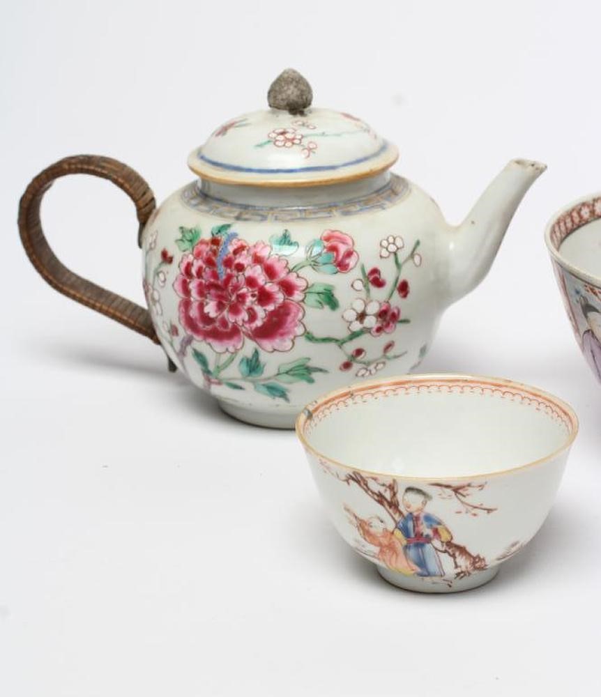 A COLLECTION OF CHINESE POLYCHROME PORCELAIN comprising a teapot and cover painted with figures on a Image