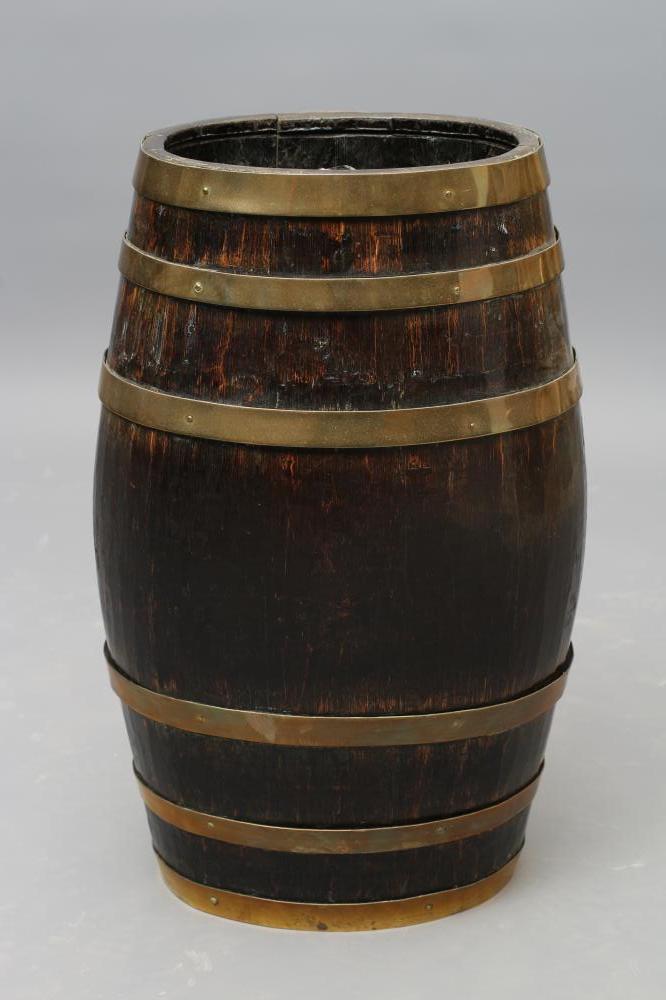 A COOPERED OAK STICK BARREL of oval form with brass banding Image
