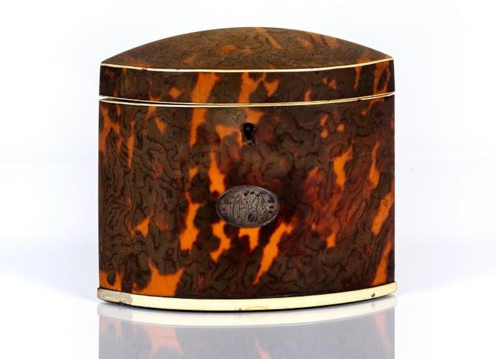 A REGENCY TORTOISESHELL SMALL TEA CADDY of navette form Image