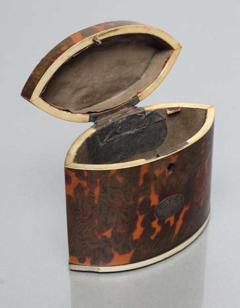 A REGENCY TORTOISESHELL SMALL TEA CADDY of navette form Image