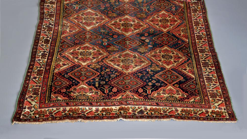 A WEST PERSIAN TRIBAL RUG Image