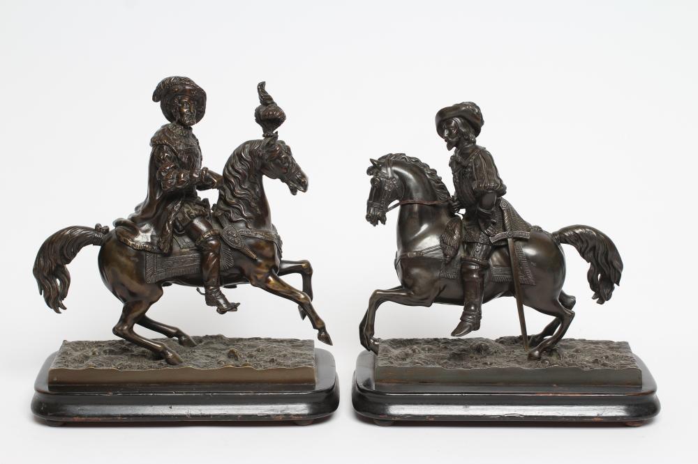 A PAIR OF BRONZE EQUESTRIAN FIGURES Image