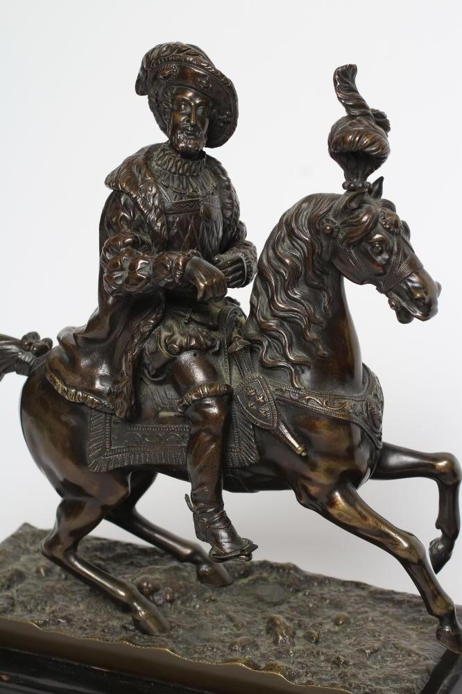 A PAIR OF BRONZE EQUESTRIAN FIGURES Image