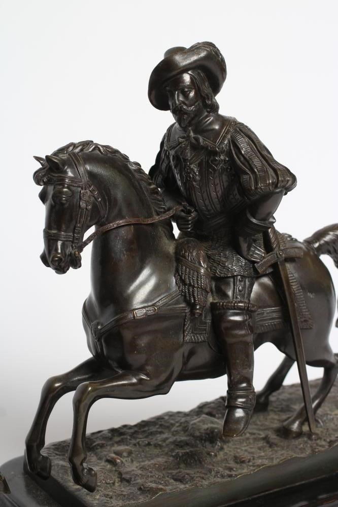 A PAIR OF BRONZE EQUESTRIAN FIGURES Image