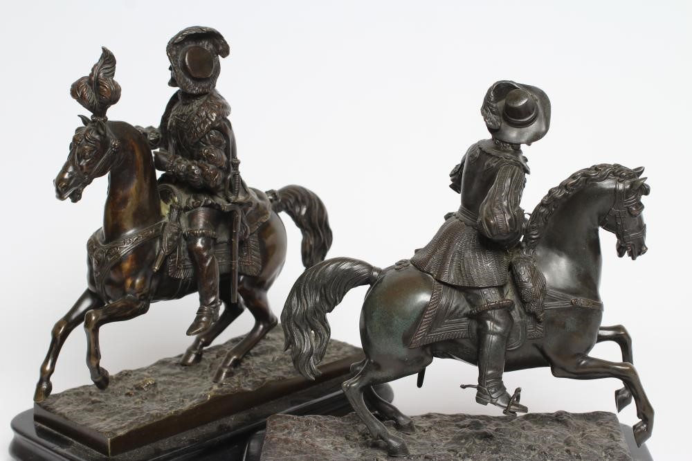 A PAIR OF BRONZE EQUESTRIAN FIGURES Image