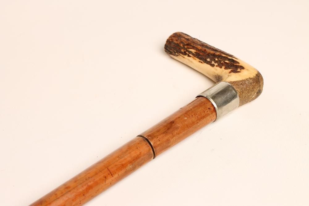 A MALACCA SWORD STICK with 17 3/4" triangular section blade bearing remnants of etched decoration Image