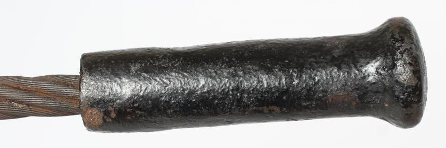 A FIRST WORLD WAR GERMAN TRENCH MACE with cast iron bulbous top and grip with flexible wire shaft Image