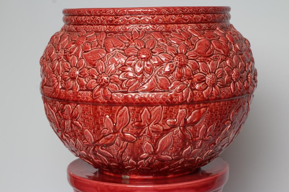 A BURMANTOFTS PINK GLAZED "FAIENCE" JARDINIERE AND STAND Image